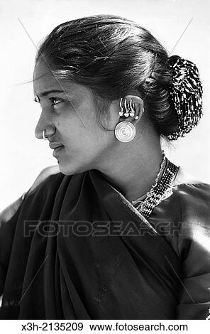 Stock Photo - portrait of young woman, India, South Asia.. Fotosearch
