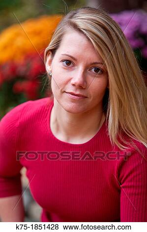 Portrait of young woman outdoors View Large Photo Image Stock Photo - Portrait of young woman outdoors. Fotosearch