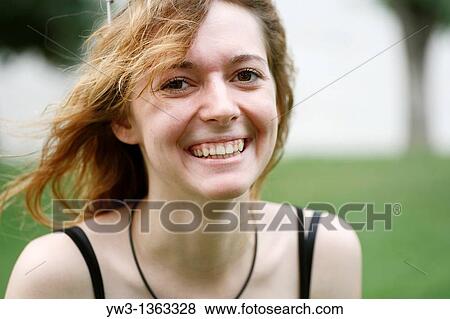 Portrait of young woman outdoors View Large Photo Image Stock Photo - Portrait of young woman outdoors. Fotosearch