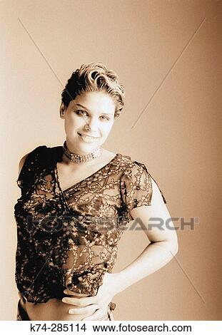 Portrait of Young Woman Smiling At Camera View Large Photo Image Picture - Portrait of Young Woman Smiling At Camera. Fotosearch