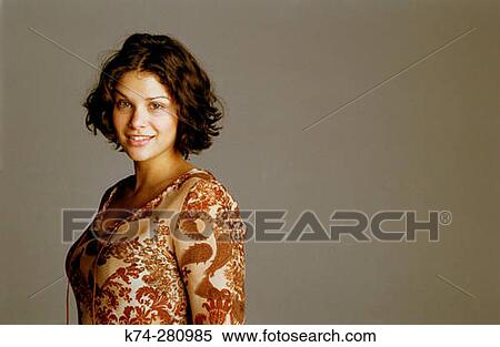 Stock Photography - Portrait of Young Woman Smiling. Fotosearch