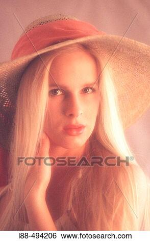 Stock Photograph - Portrait with hat.. Fotosearch