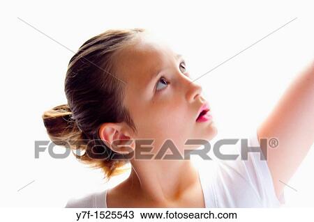 Portraiture of a young pretty girl dancing View Large Photo Image Stock Image - Portraiture of a young pretty girl dancing. Fotosearch