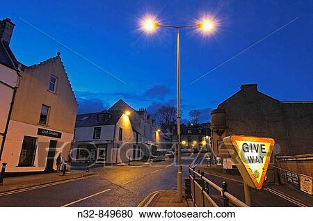 Stock Image - Portree at dusk, Skye island, Inner Hebrides, Scotland, UK. Fotosearch