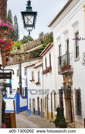 Portugal, Estremadura, Obidos. Alleyway in old town. View Large Photo Image Stock Image - Portugal, Estremadura, Obidos. Alleyway in old town.. Fotosearch