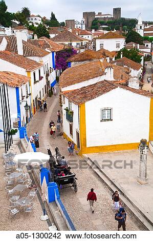 Portugal, Estremadura, Obidos. Overall view with town wall. View Large Photo Image Stock Image - Portugal, Estremadura, Obidos. Overall view with town wall.. Fotosearch