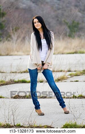 Posing on abandoned sports playground young woman View Large Photo Image Stock Image - Posing on abandoned sports playground young woman. Fotosearch