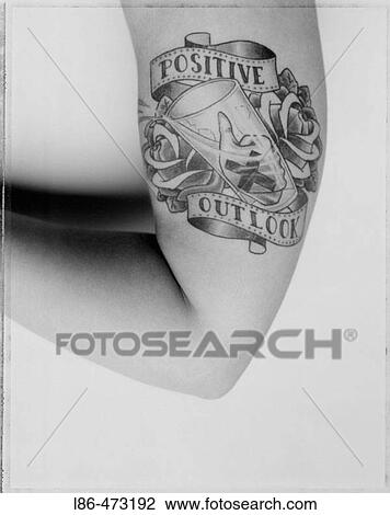 ? Positive Outlook? tattoo View Large Photo Image Stock Image - ? Positive Outlook? tattoo. Fotosearch