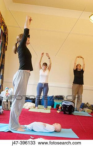 Post Natal Yoga, with babies View Large Photo Image Stock Image - Post Natal Yoga, with babies. Fotosearch