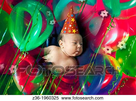 Postcard looking picture of New Year toddler in balloons. View Large Photo Image Stock Photography - Postcard looking picture of New Year toddler in balloons.. Fotosearch