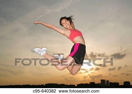 Potomac river, Washington, DC, USA, woman jogging and jumping, 23 years old. View Large Photo Image Stock Image - Potomac river, Washington, DC, USA, woman jogging and jumping, 23 years old.. Fotosearch