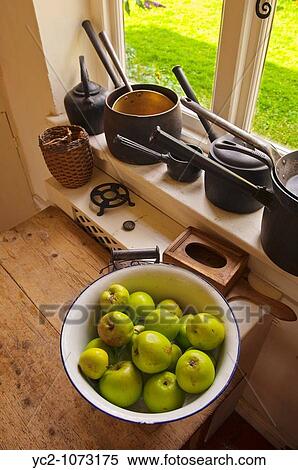 Pots and pans in an old fashioned kitchen at Gressenhall museum of rural life in North Norfolk Uk View Large Photo Image Stock Photography - Pots and pans in an old fashioned kitchen at Gressenhall museum of rural life in North Norfolk Uk. Fotosearch
