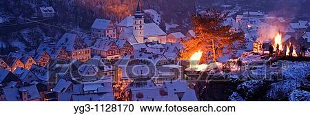 Pottenstein, Franconia, Bavaria, Germany - annual Ewige Anbetung fire festival on the evening of January 6th, 2009 View Large Photo Image Stock Image - Pottenstein, Franconia, Bavaria, Germany - annual Ewige Anbetung fire festival on the evening of January 6th, 2009. Fotosearch
