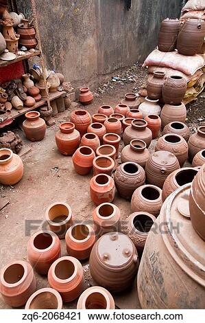 Stock Image - Pottery in the Dharavi Slum of Mumbai, India.. Fotosearch