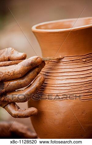 Pottery of the Dorze people of Ethiopia, Detail The tribe of the Dorze is living high up in the Guge Moutains above the ethiopian part of the rift valley Dorze can be translated with weaver View Large Photo Image Stock Image - Pottery of the Dorze people of Ethiopia, Detail The tribe of the Dorze is living high up in the Guge Moutains above the ethiopian part of the rift valley Dorze can be translated with weaver. Fotosearch