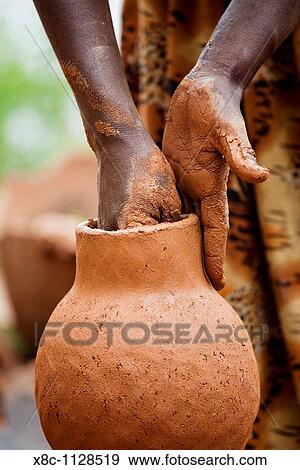 Pottery of the Dorze people of Ethiopia, Detail The tribe of the Dorze is living high up in the Guge Moutains above the ethiopian part of the rift valley Dorze can be translated with weaver View Large Photo Image Stock Photo - Pottery of the Dorze people of Ethiopia, Detail The tribe of the Dorze is living high up in the Guge Moutains above the ethiopian part of the rift valley Dorze can be translated with weaver. Fotosearch