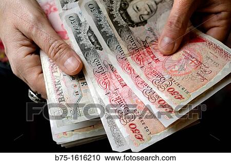 pounds in the hands View Large Photo Image Stock Image - pounds in the hands. Fotosearch