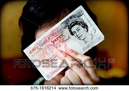 pounds sterling hidden behind View Large Photo Image Picture - pounds sterling hidden behind. Fotosearch