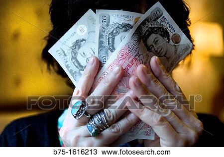 pounds sterling hidden behind View Large Photo Image Stock Image - pounds sterling hidden behind. Fotosearch