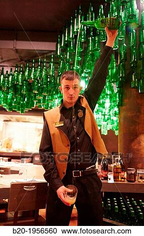 Pouring cider, Restaurant Sidrer? a Tierra Astur, Gij? n, Asturias, Spain. View Large Photo Image Stock Image - Pouring cider, Restaurant Sidrer? a Tierra Astur, Gij? n, Asturias, Spain.. Fotosearch