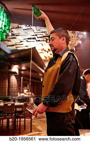 Pouring cider, Restaurant Sidrer? a Tierra Astur, Gij? n, Asturias, Spain. View Large Photo Image Stock Image - Pouring cider, Restaurant Sidrer? a Tierra Astur, Gij? n, Asturias, Spain.. Fotosearch