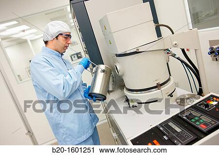 Pouring liquid nitrogen to improve the vacuum in the chamber to deposit thin films View Large Photo Image Stock Image - Pouring liquid nitrogen to improve the vacuum in the chamber to deposit thin films. Fotosearch