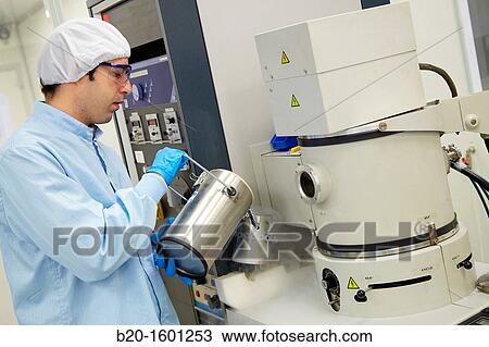 Pouring liquid nitrogen to improve the vacuum in the chamber to deposit thin films View Large Photo Image Stock Image - Pouring liquid nitrogen to improve the vacuum in the chamber to deposit thin films. Fotosearch