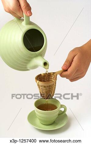 Pouring tea View Large Photo Image Stock Image - Pouring tea. Fotosearch