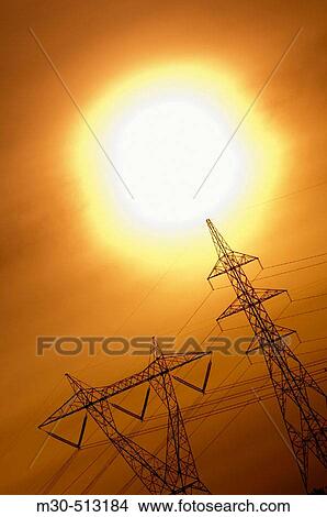 Power lines and sun. View Large Photo Image Picture - Power lines and sun.. Fotosearch