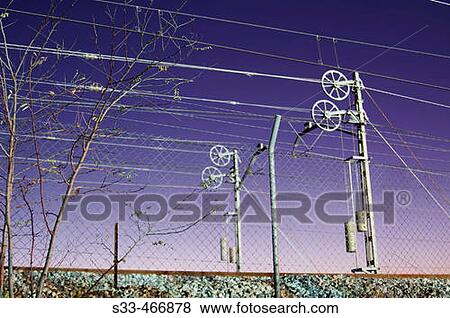 Power lines with counterweights at railway. Pinto, Madrid, Spain View Large Photo Image Stock Photo - Power lines with counterweights at railway. Pinto, Madrid, Spain. Fotosearch