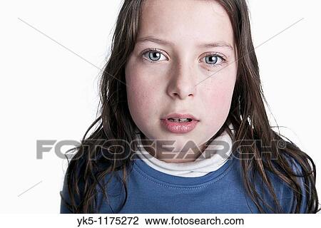 Stock Image - Powerful Shot of an Upset Brown Haired Child. Fotosearch