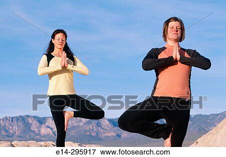 Practicing yoga at Snow Canyon State Park. Utah, USA View Large Photo Image Stock Photo - Practicing yoga at Snow Canyon State Park. Utah, USA. Fotosearch