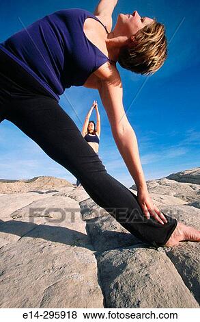 Practicing yoga at Snow Canyon State Park. Utah, USA View Large Photo Image Stock Photo - Practicing yoga at Snow Canyon State Park. Utah, USA. Fotosearch