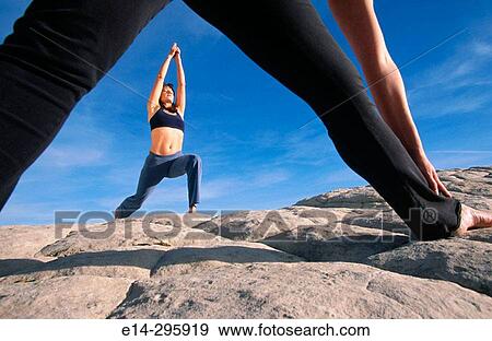 Practicing yoga at Snow Canyon State Park. Utah, USA View Large Photo Image Stock Photo - Practicing yoga at Snow Canyon State Park. Utah, USA. Fotosearch