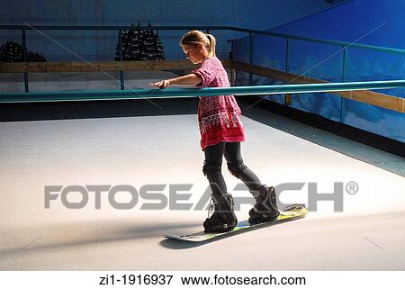 practising snowboarding at rolling carpet View Large Photo Image Stock Photo - practising snowboarding at rolling carpet. Fotosearch