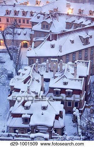 prague - winter view of lesser town rooftops covered with snow View Large Photo Image Stock Photo - prague - winter view of lesser town rooftops covered with snow. Fotosearch