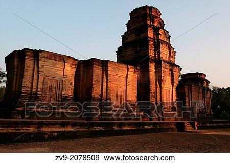 Prasat Kravan is a small 10th century temple consisting of five reddish brick towers on a platform, located at Angkor, Cambodia south of Srah Srang. The modern name in Khmer, "Prasat Kravan, " means "cardamom temple. " View Large Photo Image Stock Photo - Prasat Kravan is a small 10th century temple consisting of five reddish brick towers on a platform, located at Angkor, Cambodia south of Srah Srang. The modern name in Khmer, "Prasat Kravan, " means "cardamom temple. ". Fotosearch