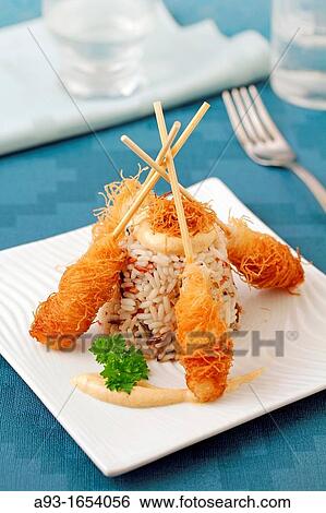 Prawn brochettes with Chinese noodles View Large Photo Image Stock Photograph - Prawn brochettes with Chinese noodles. Fotosearch