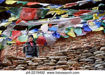Prayer flags at Chungsi gompa, Padmasambhava's meditation cave. Nepal, Gandaki, Upper Mustang (near the border with Tibet). Model Released. View Large Photo Image Stock Image - Prayer flags at Chungsi gompa, Padmasambhava's meditation cave. Nepal, Gandaki, Upper Mustang (near the border with Tibet). Model Released.. Fotosearch