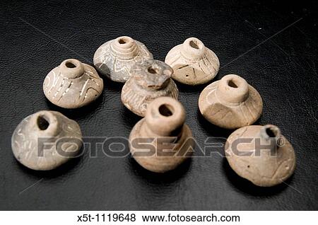 Stock Photo - Pre-Columbian art on black background. Fotosearch