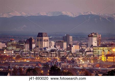 Predawn light on central city Christchurch, foothills of Southern Alps behind, early winter, Canterbury, New Zealand View Large Photo Image Stock Image - Predawn light on central city Christchurch, foothills of Southern Alps behind, early winter, Canterbury, New Zealand. Fotosearch