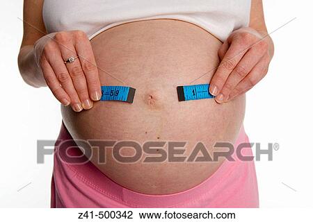 Pregnant belly View Large Photo Image Stock Image - Pregnant belly. Fotosearch