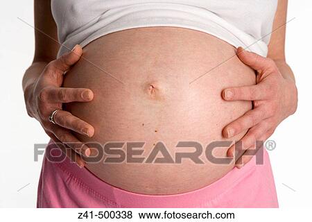 Pregnant belly View Large Photo Image Stock Photo - Pregnant belly. Fotosearch