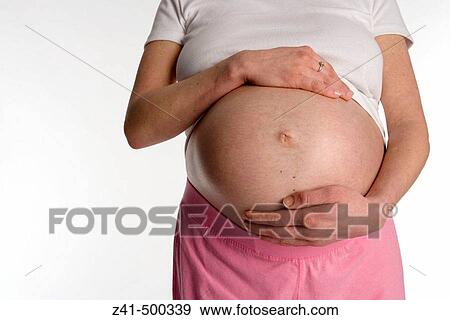 Stock Photo - Pregnant belly. Fotosearch