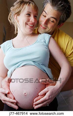 Pregnant couple View Large Photo Image Picture - Pregnant couple. Fotosearch