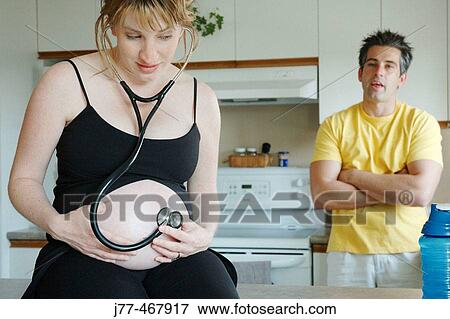 Pregnant couple View Large Photo Image Stock Photo - Pregnant couple. Fotosearch