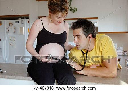 Pregnant couple View Large Photo Image Stock Photo - Pregnant couple. Fotosearch