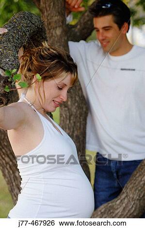 Stock Photograph - Pregnant couple. Fotosearch