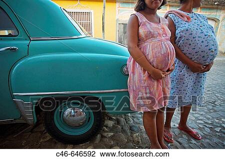 Pregnant ladies outside a clinic for pregnat women, Trinidad city, Sancti Spiritus Province, Cuba View Large Photo Image Stock Image - Pregnant ladies outside a clinic for pregnat women, Trinidad city, Sancti Spiritus Province, Cuba. Fotosearch