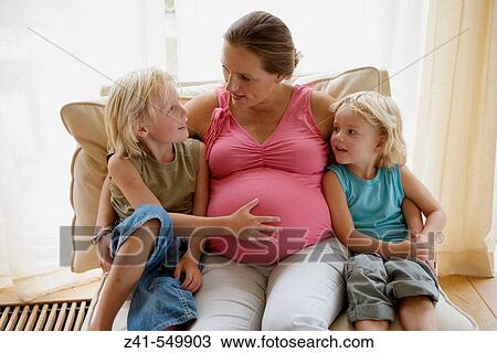 Pregnant mother with two sons. View Large Photo Image Stock Image - Pregnant mother with two sons.. Fotosearch